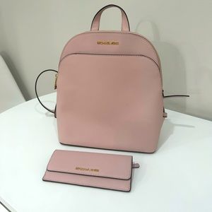 NEVER USED Michael Kors dusty pink backpack with matching wallet.